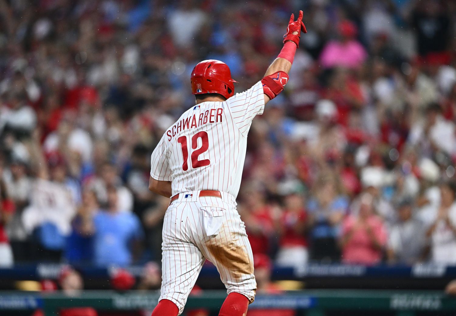 Sep 9, 2023; Philadelphia, Pennsylvania, USA; Philadelphia Phillies outfielder Kyle Schwarber (12) reacts after hitting a three-run home run against the Miami Marlins in the second inning at Citizens Bank Park. Mandatory Credit: Kyle Ross-USA TODAY Sports